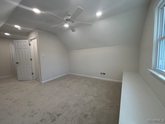 bonus room with visible vents, ceiling fan, lofted ceiling, and carpet floors