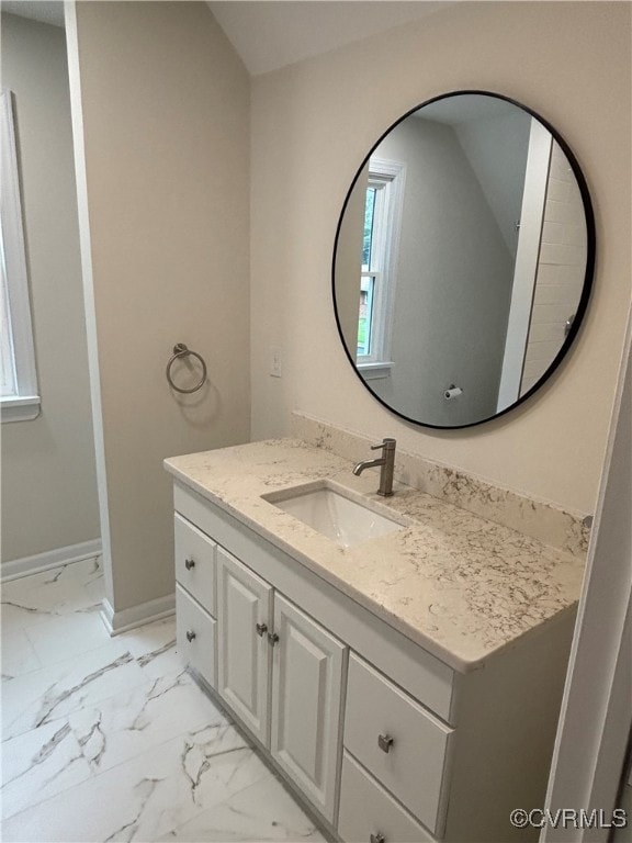 1409 Virginia Ave, Glen Allen, VA 23060 - bathroom with baseboards, marble finish floor, and vanity
