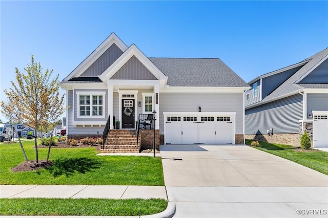 9342 Widthby Rd, Chesterfield, VA 23832 - craftsman-style home featuring a garage, board and batten siding, driveway, and a front yard