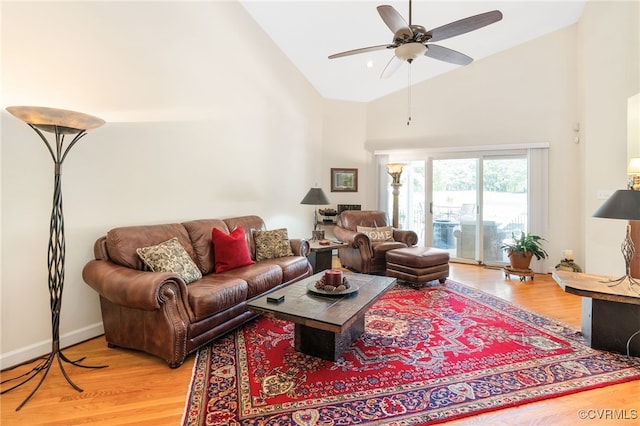 10932 Dominion Fairways Ln, Glen Allen, VA 23059 - living room with light wood-type flooring, high vaulted ceiling, and a ceiling fan