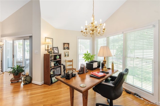 10932 Dominion Fairways Ln, Glen Allen, VA 23059 - office featuring baseboards, light wood finished floors, an inviting chandelier, and high vaulted ceiling