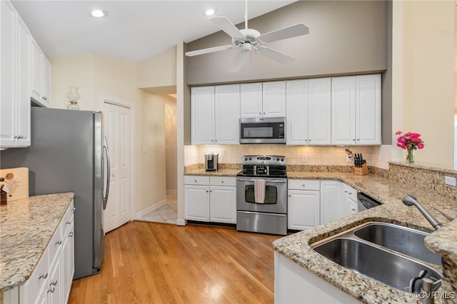 10932 Dominion Fairways Ln, Glen Allen, VA 23059 - kitchen with decorative backsplash, stainless steel appliances, ceiling fan, and a sink