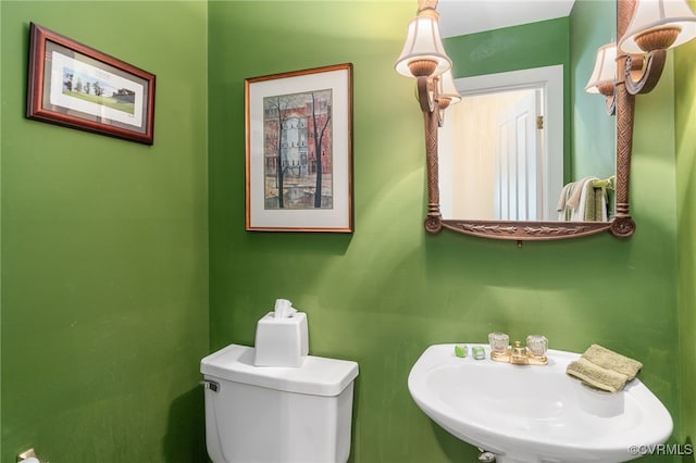 10932 Dominion Fairways Ln, Glen Allen, VA 23059 - half bathroom with toilet and a sink