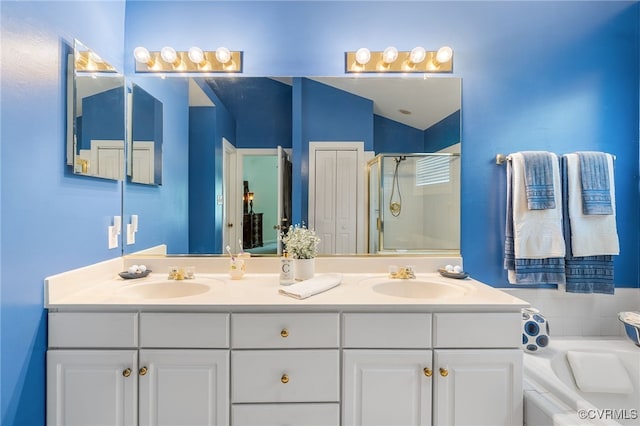 10932 Dominion Fairways Ln, Glen Allen, VA 23059 - full bath featuring a shower stall, double vanity, and a sink