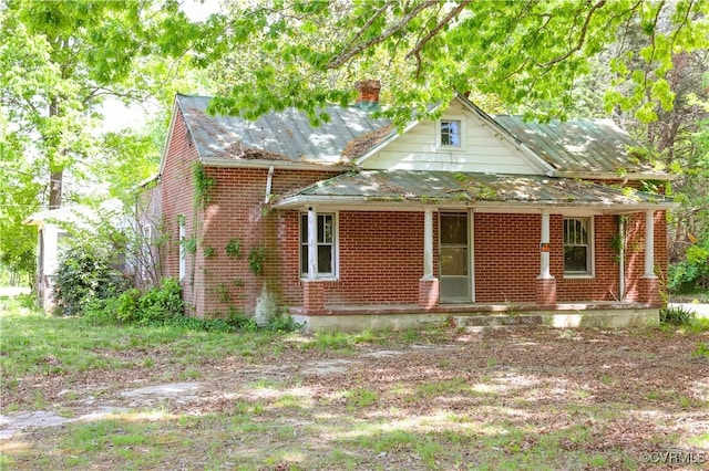 view of front of property with brick siding