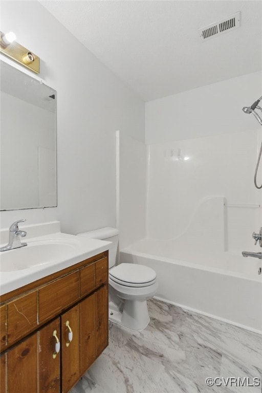 full bath featuring toilet, shower / bath combination, vanity, and marble finish flooring