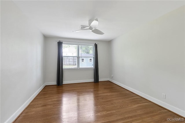 3454 Warner Rd, Richmond, VA 23225 - spare room with wood finished floors, a ceiling fan, and baseboards