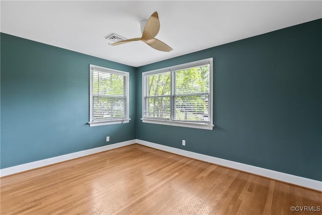 3454 Warner Rd, Richmond, VA 23225 - spare room featuring wood finished floors, baseboards, and a ceiling fan