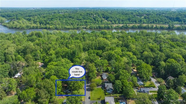 3454 Warner Rd, Richmond, VA 23225 - aerial view of property and surrounding area with a heavily wooded area, a nearby body of water, and property parcel outlined
