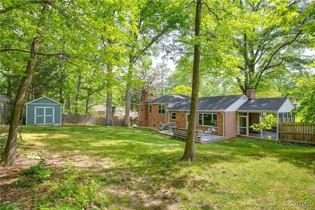 3454 Warner Rd, Richmond, VA 23225 - view of yard featuring a shed, an outdoor structure, and a patio area