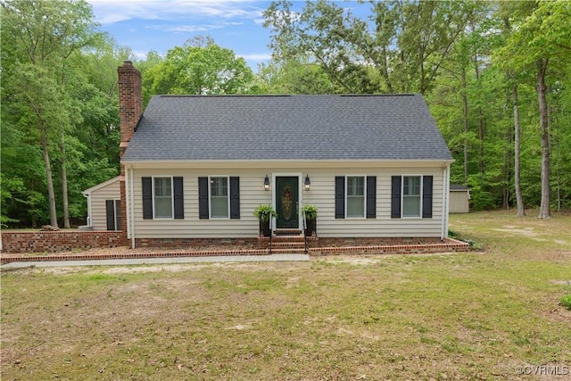 view of front of property with crawl space, a chimney, a shingled roof, and a front lawn