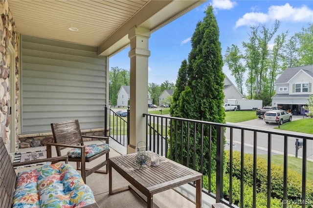 balcony featuring a residential view