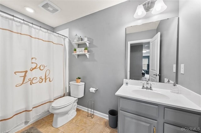 full bathroom with vanity, toilet, tile patterned floors, baseboards, and visible vents