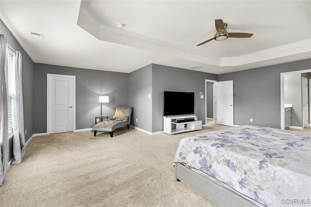 bedroom with crown molding, a raised ceiling, baseboards, and light carpet