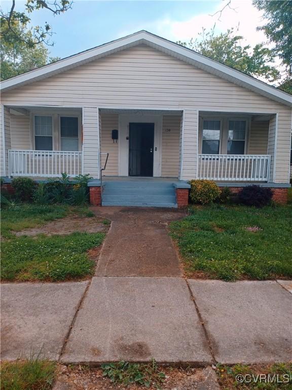 bungalow-style home featuring a porch