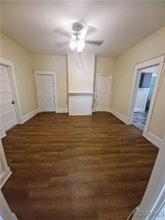 130 Elm St, Petersburg, VA 23803 - unfurnished bedroom featuring wood finished floors, baseboards, and a ceiling fan