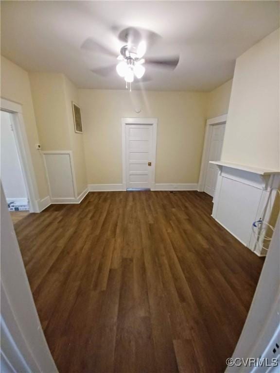 130 Elm St, Petersburg, VA 23803 - spare room featuring ceiling fan, dark wood-style flooring, and baseboards