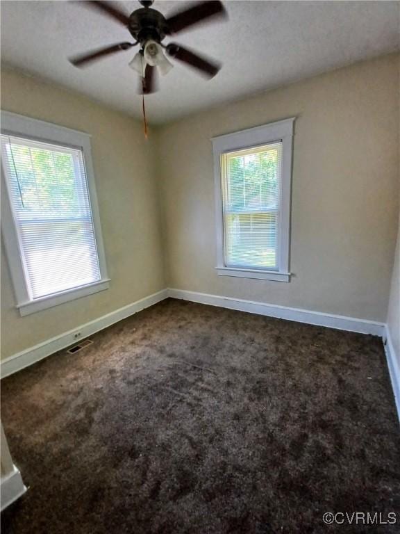 130 Elm St, Petersburg, VA 23803 - unfurnished room with carpet, baseboards, and ceiling fan