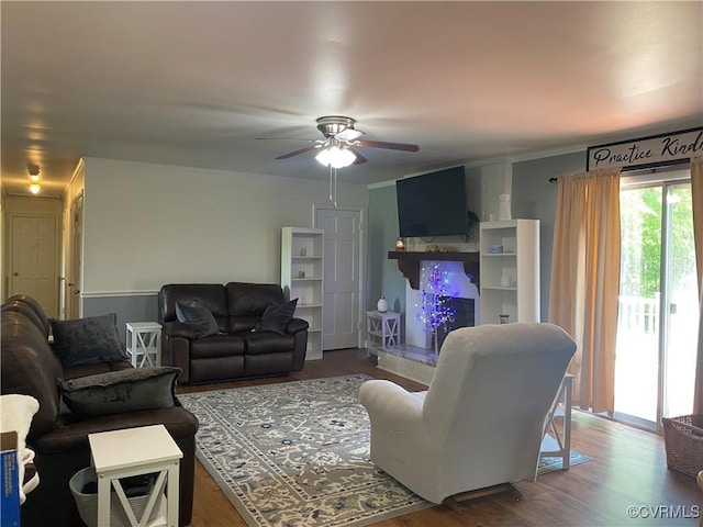 1195 Stingy Lane Rd, Blackstone, VA 23824 - living area with a ceiling fan and wood finished floors