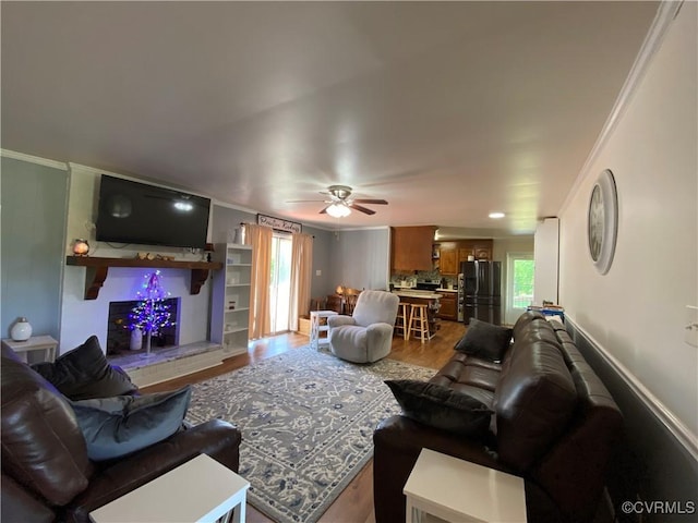 1195 Stingy Lane Rd, Blackstone, VA 23824 - living area featuring a ceiling fan, ornamental molding, and wood finished floors