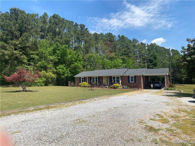 1195 Stingy Lane Rd, Blackstone, VA 23824 - ranch-style house with covered porch, a carport, a front yard, and gravel driveway
