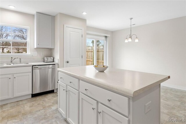 4334 Kidsgrove Rd, Henrico, VA 23231 - kitchen with stainless steel dishwasher, a sink, healthy amount of natural light, a kitchen island, and recessed lighting