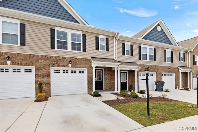 4334 Kidsgrove Rd, Henrico, VA 23231 - multi unit property featuring driveway, brick siding, and a garage