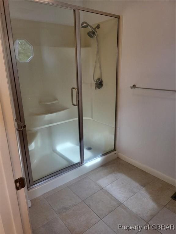80 Anchorage Dr, Newport News, VA 23602 - bathroom featuring baseboards, tile patterned flooring, and a stall shower