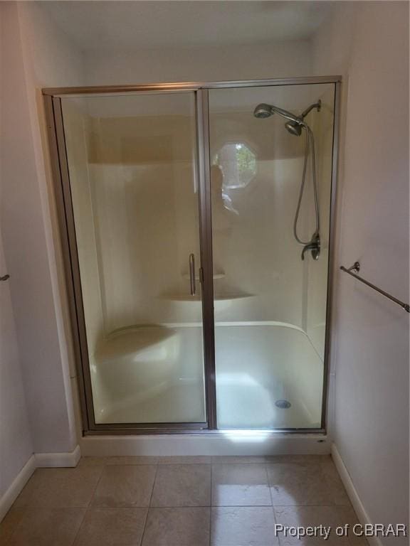 80 Anchorage Dr, Newport News, VA 23602 - full bathroom with baseboards, tile patterned flooring, and a shower stall