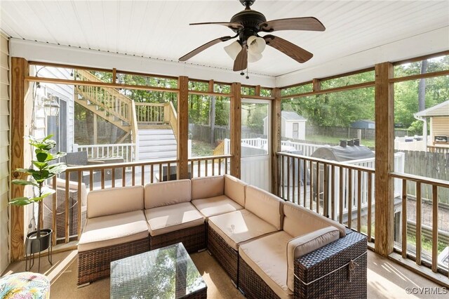 sunroom featuring an outdoor hangout area and ceiling fan