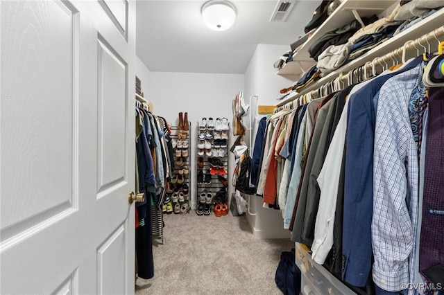 spacious closet with carpet and visible vents