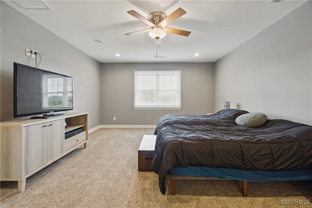 bedroom with baseboards, ceiling fan, light carpet, and recessed lighting
