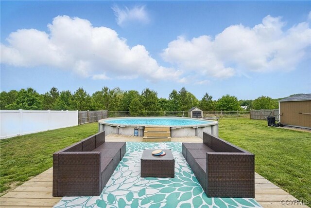 view of patio / terrace with an outdoor living space, a fenced backyard, an outbuilding, and a storage shed