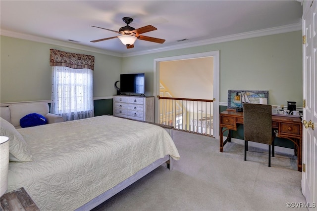 carpeted bedroom featuring a ceiling fan, visible vents, and ornamental molding