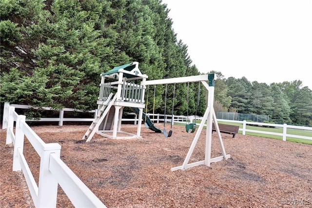 community jungle gym with fence