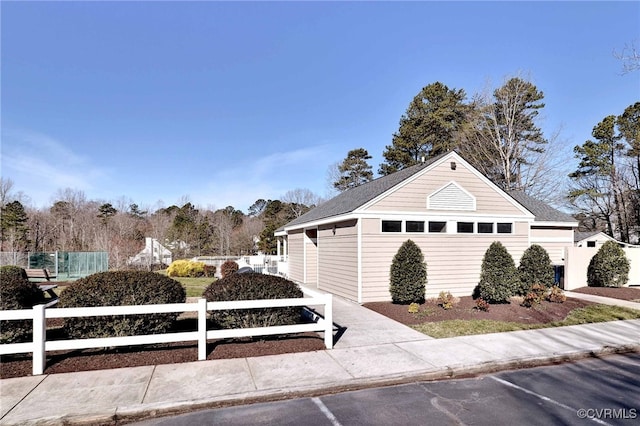 view of front of house with fence