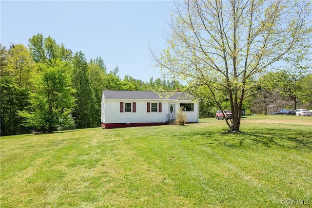 exterior space featuring a front lawn