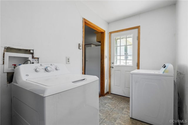 clothes washing area with laundry area and washing machine and dryer