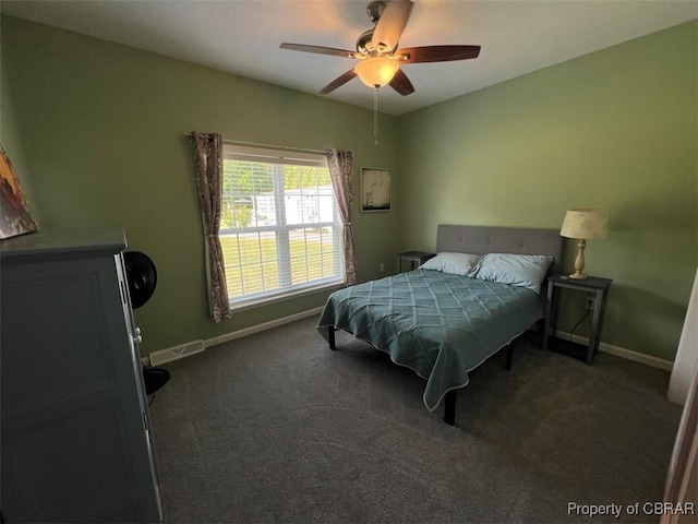 bedroom with baseboards, ceiling fan, carpet, and visible vents