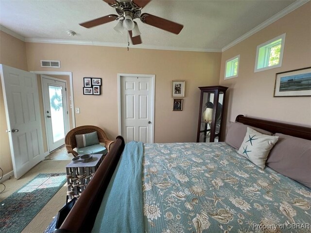 497 Mill Wharf Rd, Wake, VA 23176 - carpeted bedroom featuring ornamental molding, baseboards, a ceiling fan, and visible vents