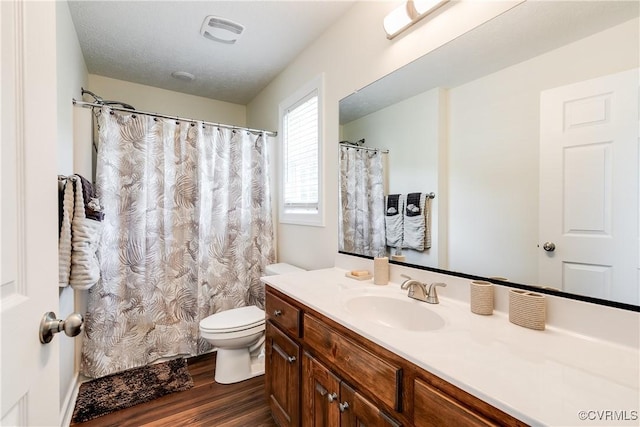 4721 Red Coach Ln, Sandston, VA 23150 - bathroom featuring wood finished floors, toilet, and vanity