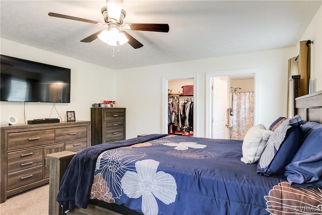 4721 Red Coach Ln, Sandston, VA 23150 - bedroom featuring a walk in closet, carpet flooring, a ceiling fan, a closet, and ensuite bath