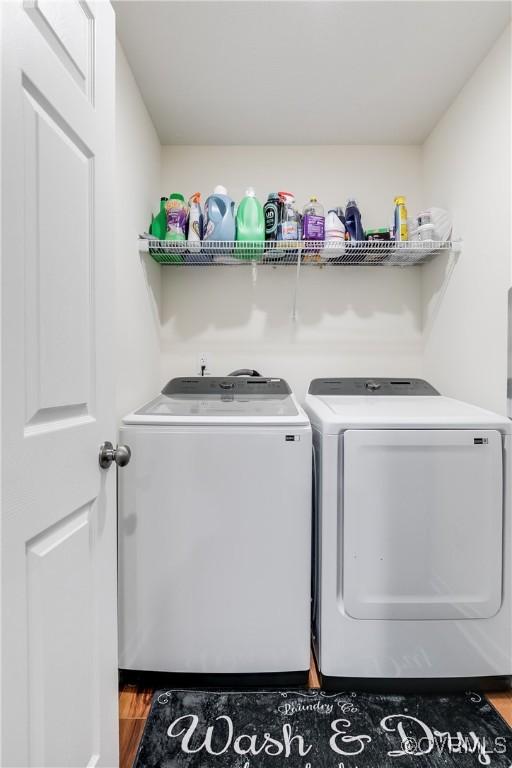 4721 Red Coach Ln, Sandston, VA 23150 - laundry area with washing machine and dryer and wood finished floors
