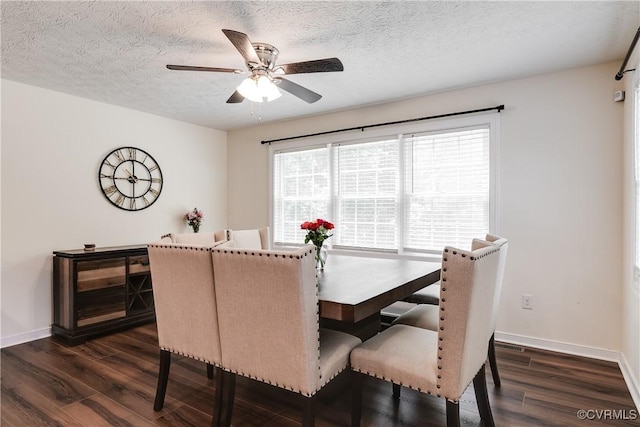 4721 Red Coach Ln, Sandston, VA 23150 - dining area featuring dark wood-style flooring, ceiling fan, baseboards, and a textured ceiling