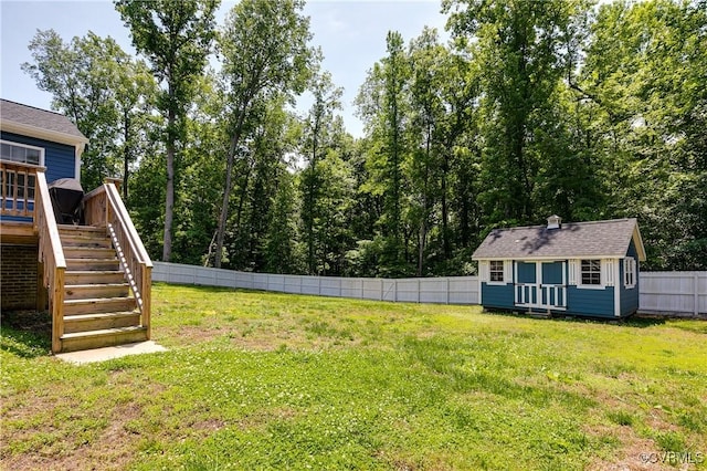 4721 Red Coach Ln, Sandston, VA 23150 - view of yard with stairs, an outbuilding, and a deck