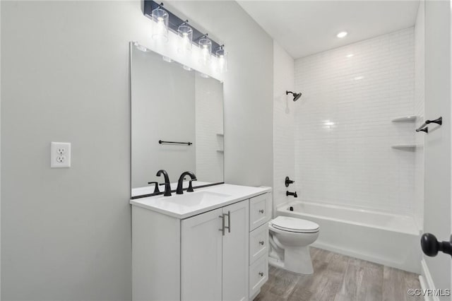 1910 Rose Ave, Richmond, VA 23222 - full bath featuring vanity, wood finished floors, bathing tub / shower combination, and toilet
