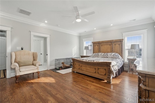 1910 Rose Ave, Richmond, VA 23222 - bedroom featuring crown molding, recessed lighting, wood finished floors, and visible vents