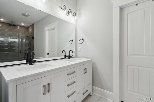 1910 Rose Ave, Richmond, VA 23222 - full bath featuring visible vents, a sink, marble finish floor, and a stall shower