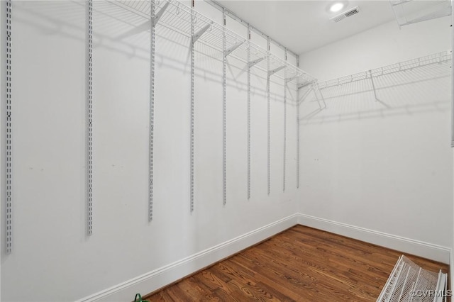 1910 Rose Ave, Richmond, VA 23222 - spacious closet with visible vents and wood finished floors