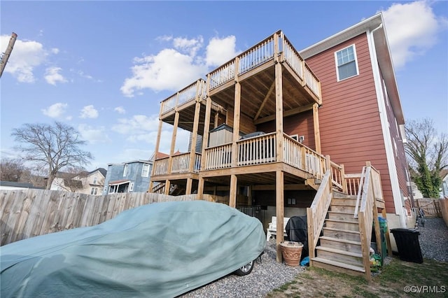 1910 Rose Ave, Richmond, VA 23222 - back of house with a wooden deck, fence, and stairs